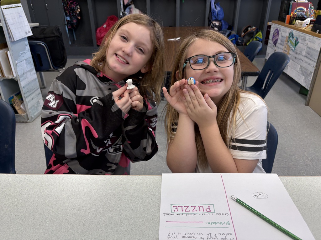 glenview third-grade aftercare photo of students solving a puzzle