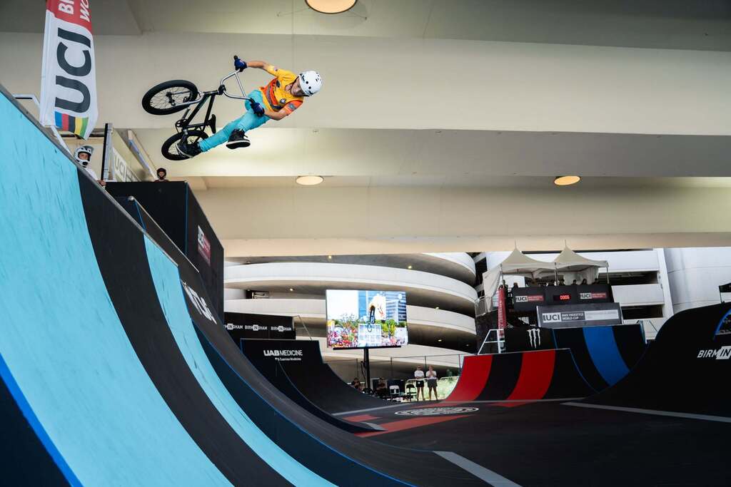 BMS rider on his bike attempting a ramp.