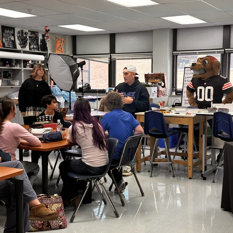 Rex sunahara with bay high school students in a classroom