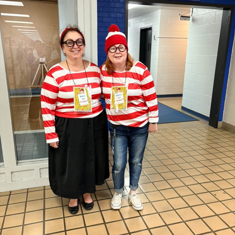 two school staffers dressed as Waldo