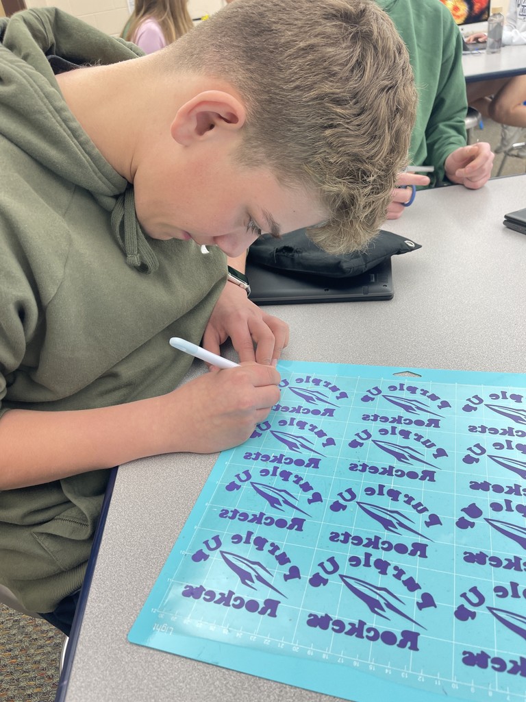 BMS makerspace students make purple up items for military connected students photo