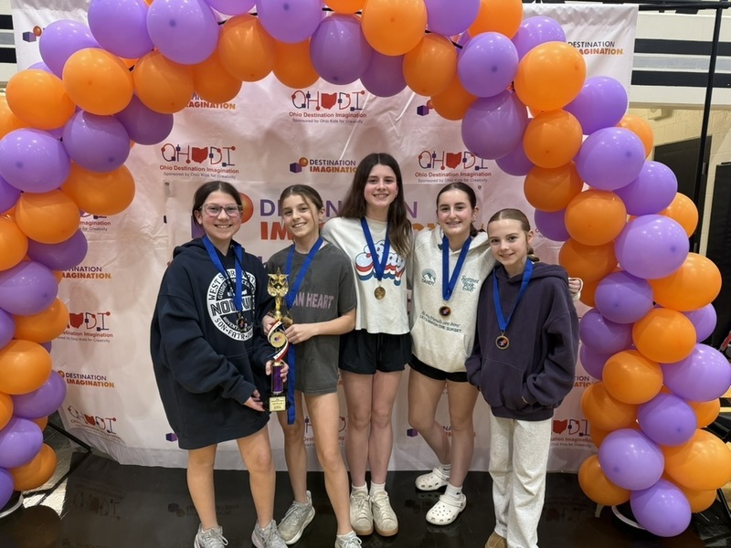 6th grade team of destination imagination students celebrating their bid to nation competition photo