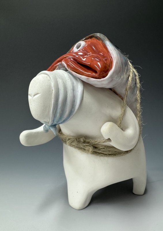 ceramic piece that won gold at scholastic art awards by bay high school senior sophia dicicco depicts an old woman carrying a fish on her back