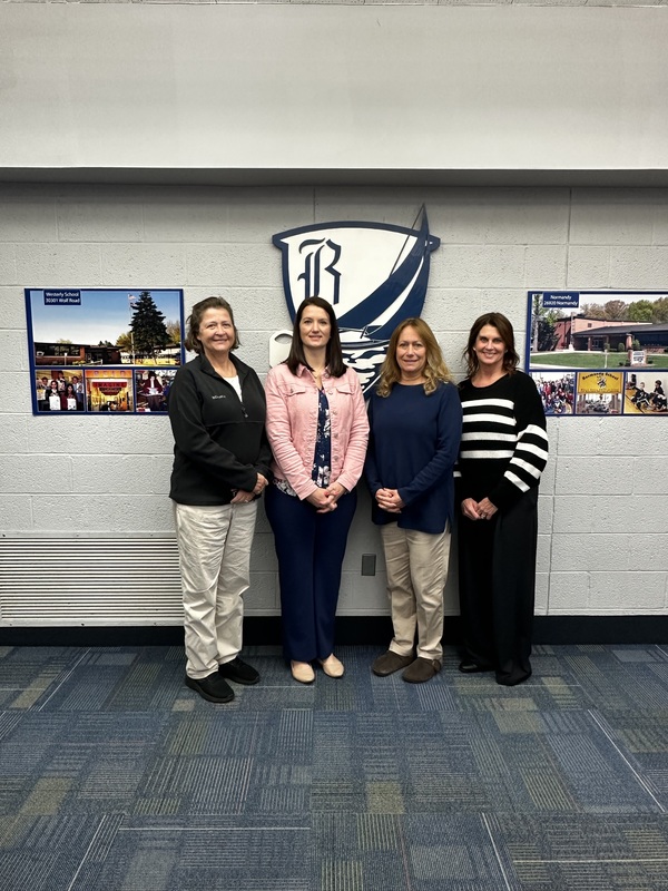 this photo is of four ladies who make up the finance department of bay village schools