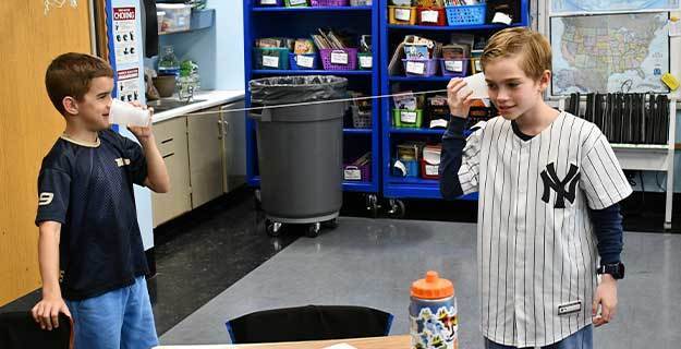 BBP High School science students lead hands-on labs for Academy Street students