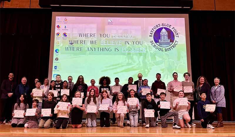 Students being honored by Board of Education.