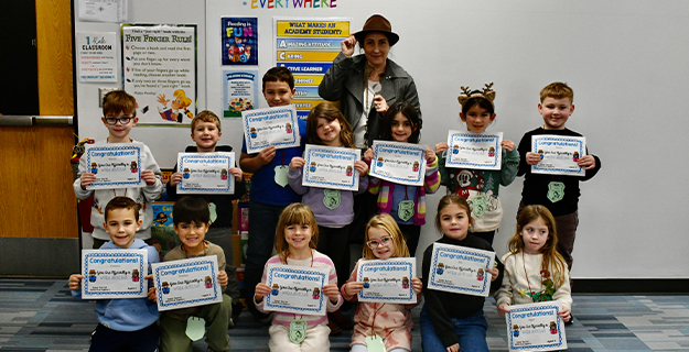 Academy Street students master reading mysteries as word detectives