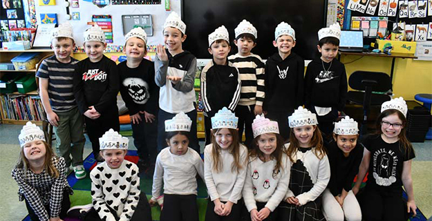 Academy Street first graders mark end of penguin unit  with Black and White Day