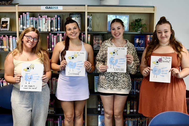 Seniors in Mrs. Pintar’s AP Literature class took a trip down memory lane during one of their final days together, gathering in the library for a special read-aloud reminiscent of their elementary school years.