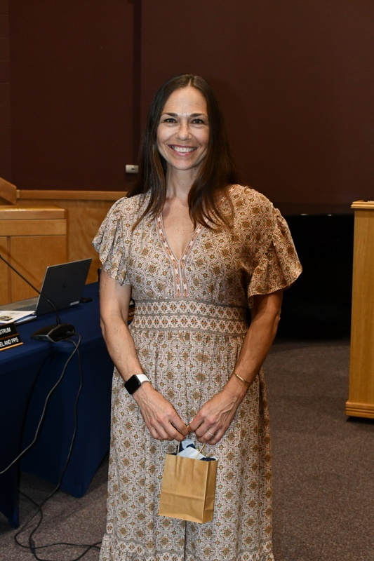 woman dressed in formal attire