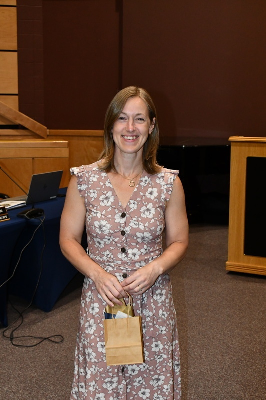 woman dressed in formal attire