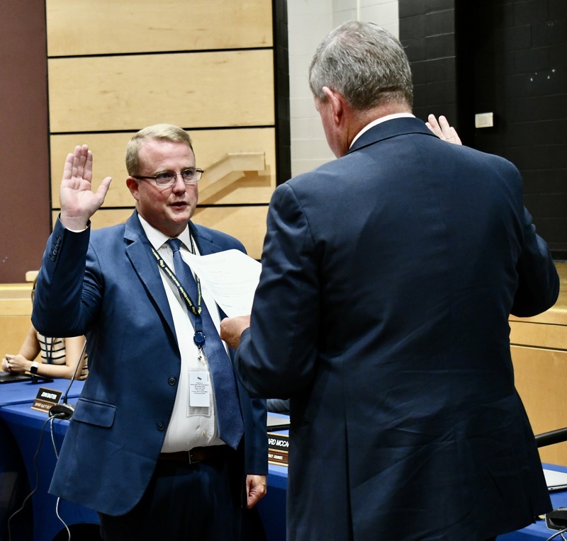 Photo of member being sworn in.