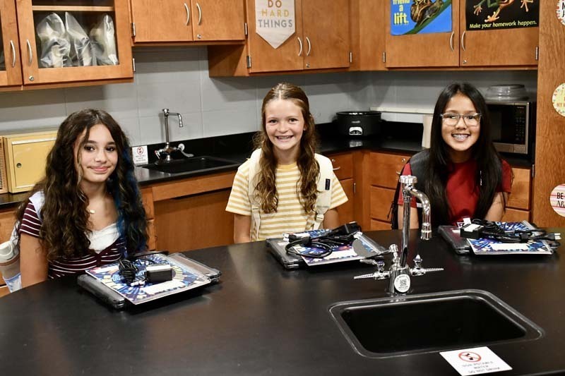 Students smiling together.