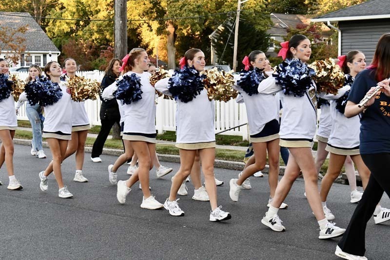 Students marching in parade.