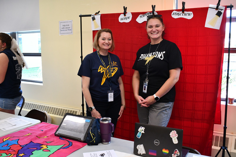 2 students at their booth