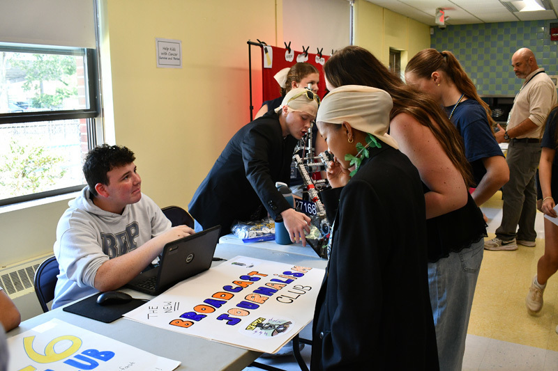 2 students at their booth