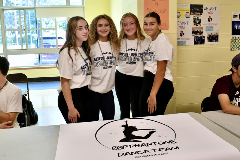 4 students at their booth