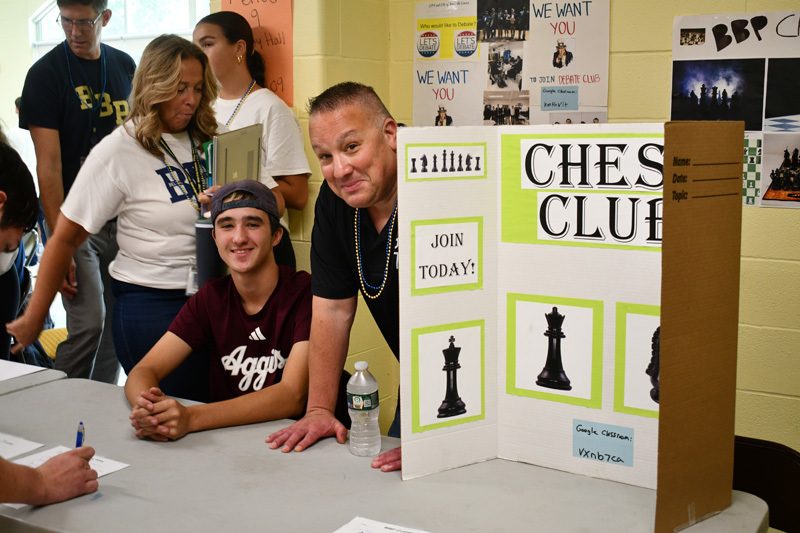 2 students at their booth