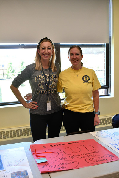 2 students at their booth