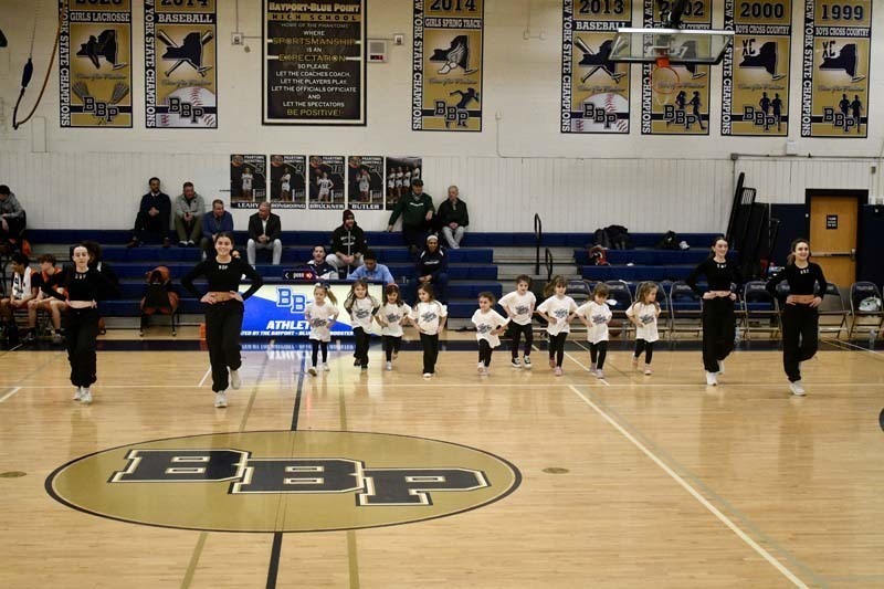 Students dancing in gymnasium.