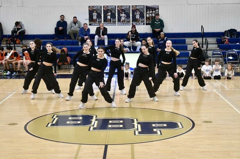 Students dancing in gymnasium.