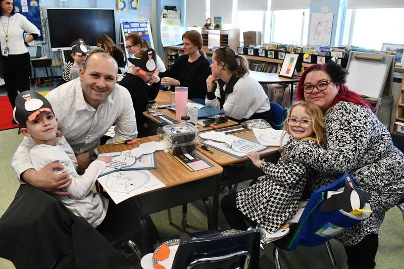 Academy Street first graders mark end of penguin unit with Black and White Day