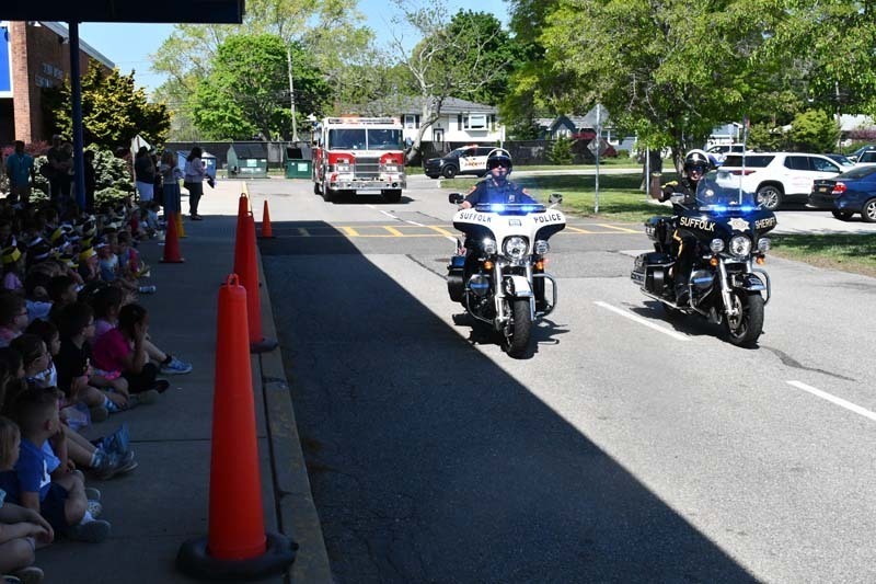 Two police officers on motorcycles.