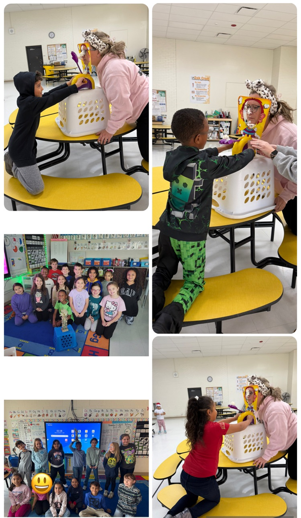 2nd grade students pieing Ms. Young!