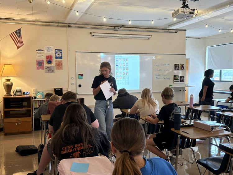 Ms. Ohlde checking in with her students.