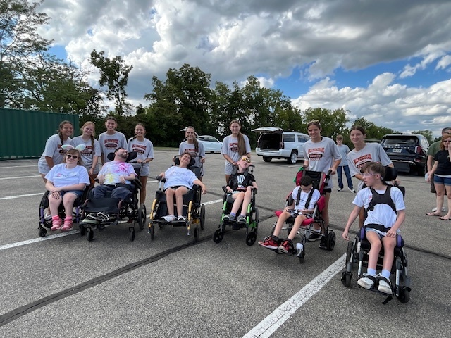 Girls Soccer Players help out with Dayton TOPSSoccer Team