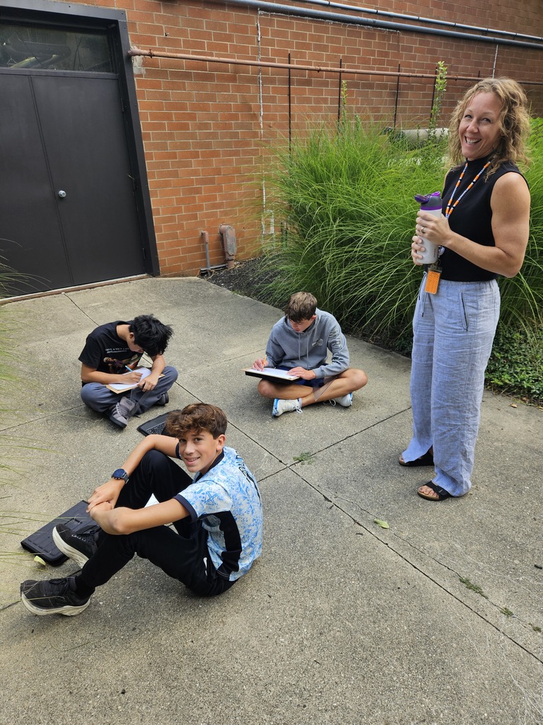 Students learning outside at Ferguson Hall