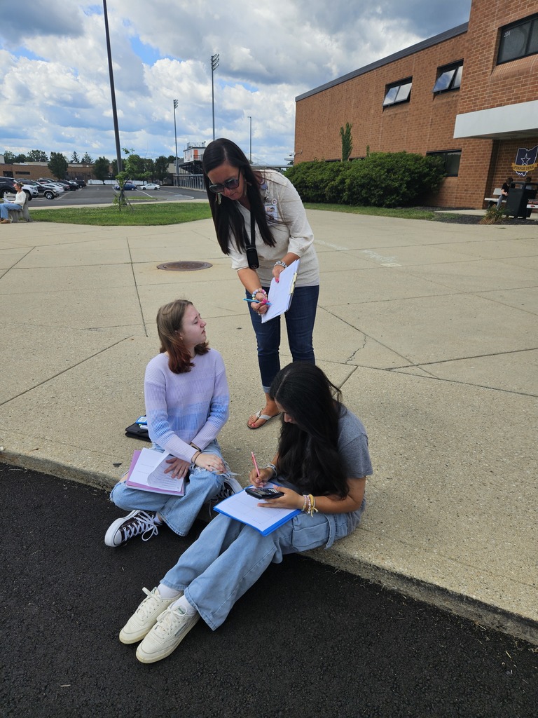 Students learning outside at Ferguson Hall