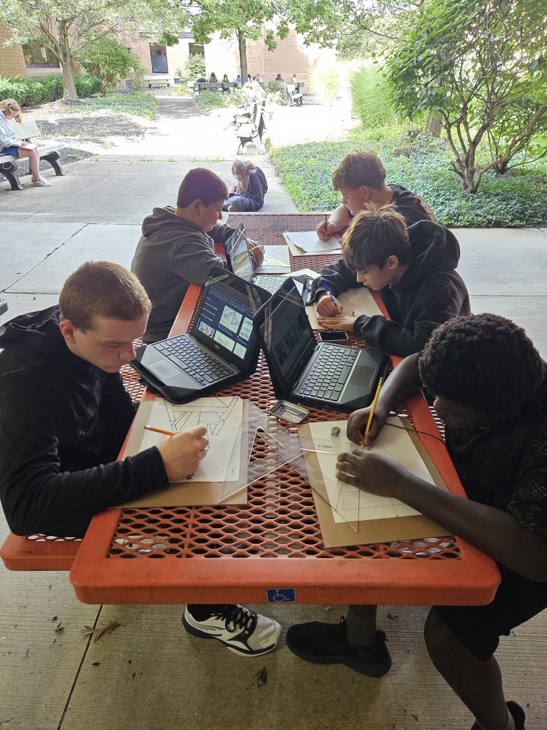 Students learning outside at Ferguson Hall