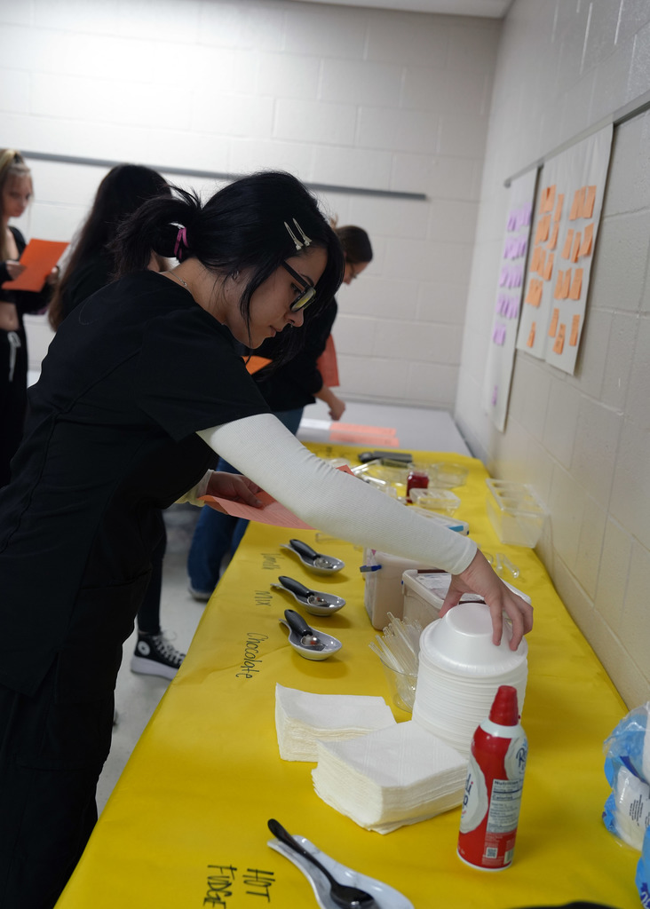 Principles  of Allied Health Class making Ice cream sundaes