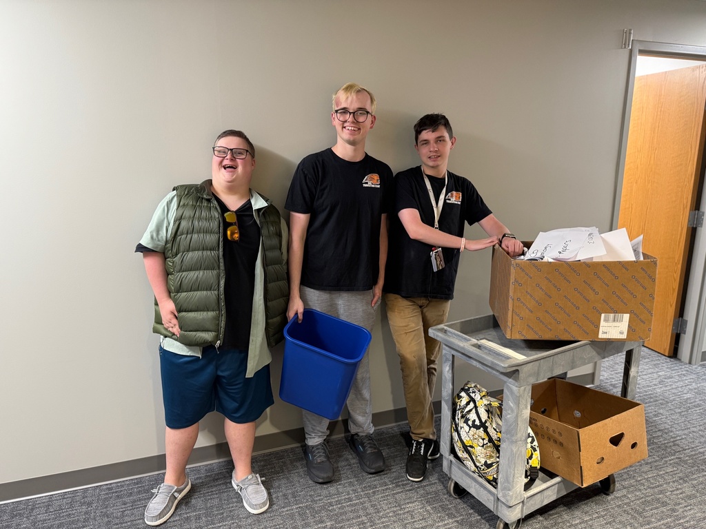 Students from the BHS Transition Class pick up recycling at Central Office