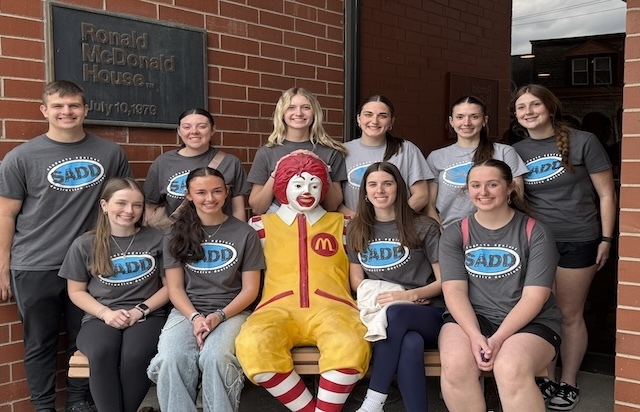 SADD students around Ronald McDonald 