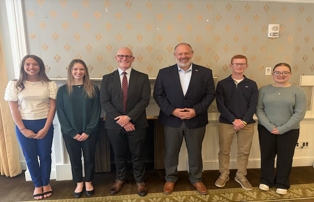 NHS students standing with Honorable President Judge Livengood and Representative Topper
