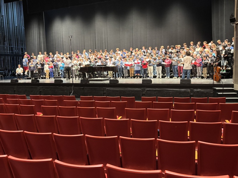 Men rehearsing for Dr. Christopher Kiver