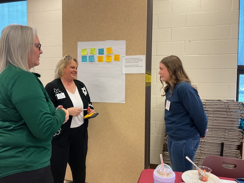 Riley Vent talking with a chanber of commerce spokesperson