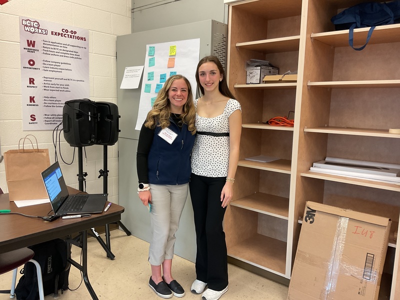 Sophia Genditzki taking a photo with a stakeholder