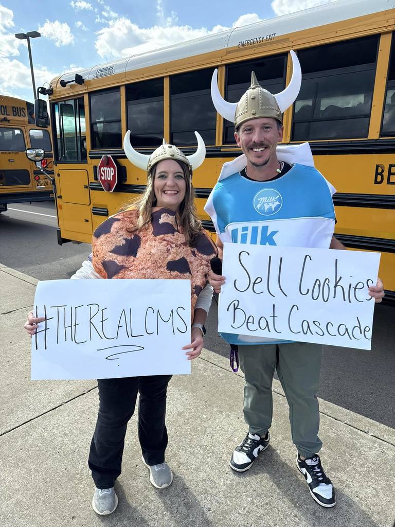 Dr. Cook and Mr. Brown in cookie and milk costumes