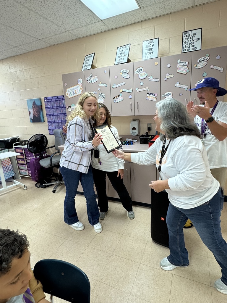 Surprised teacher gets award