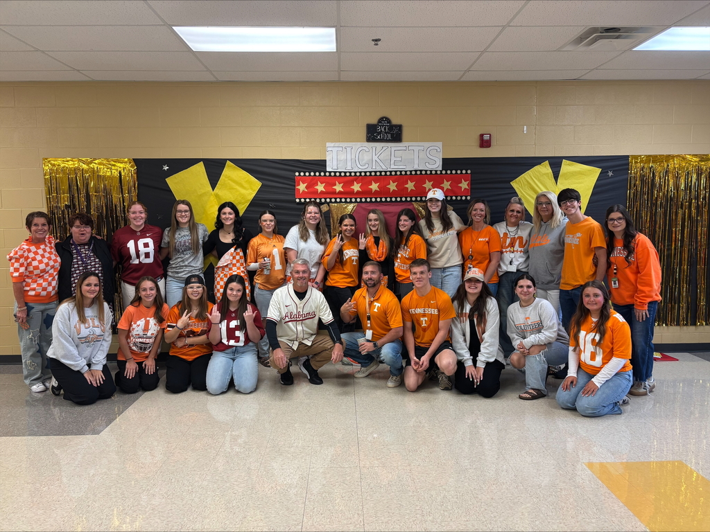 Students and staff in college attire