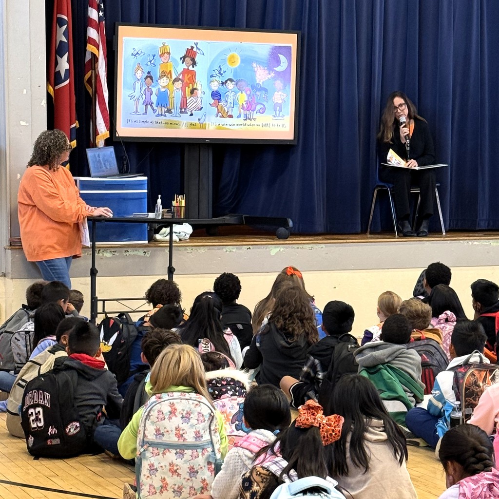 Dr. Garrett at Eakin Elementary for Friendship Day reading a book
