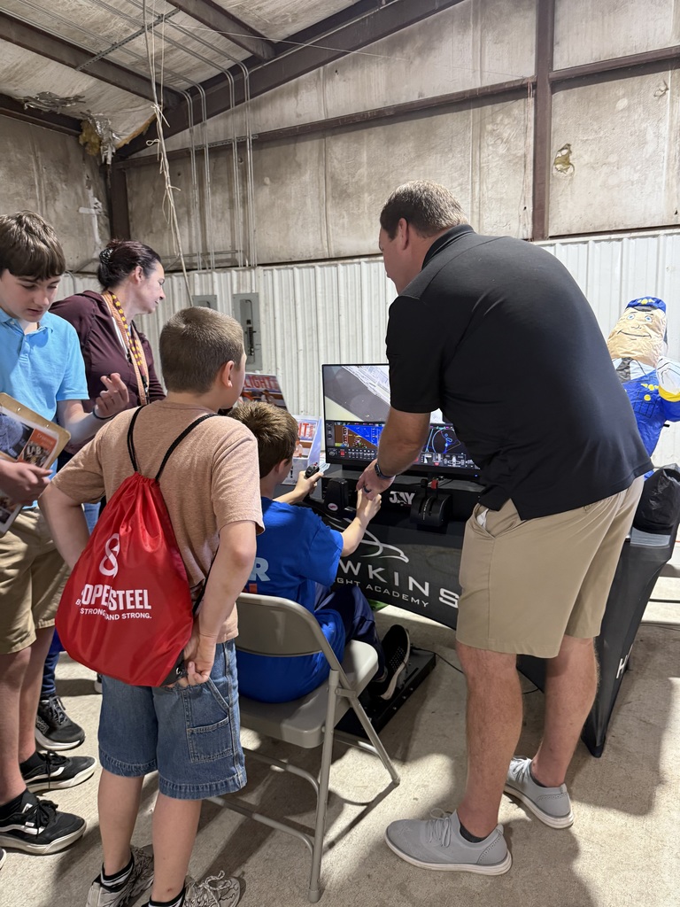 Students talking to a vendor