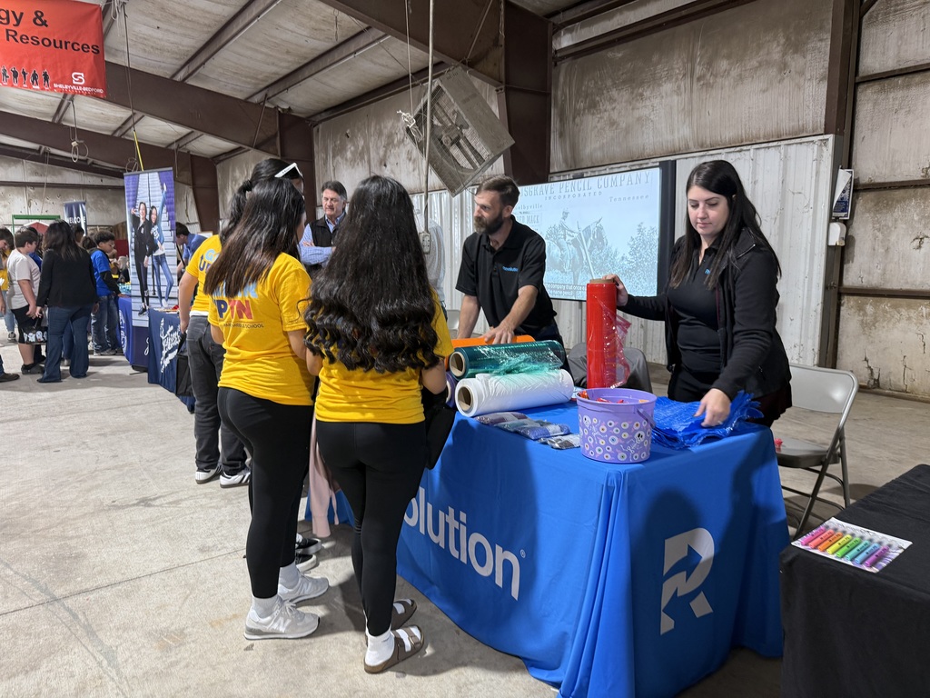 Students talking to a vendor
