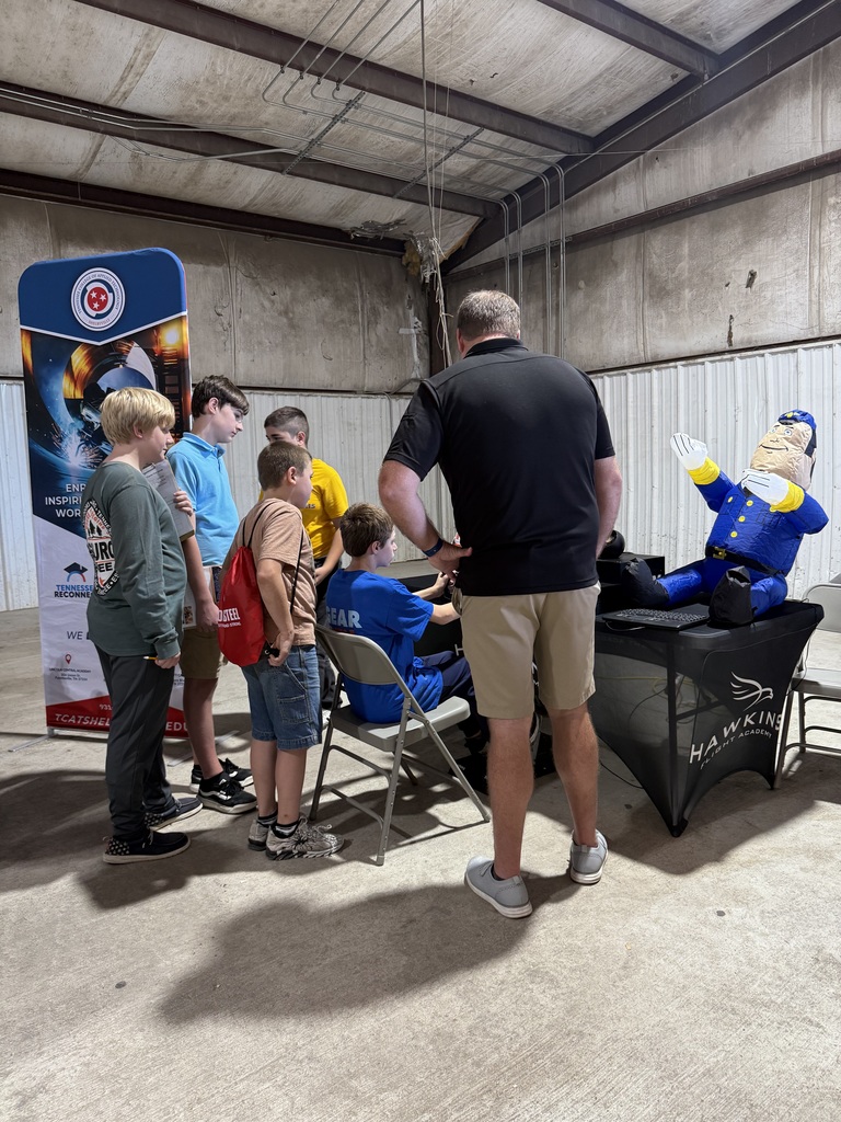 Students talking to a vendor