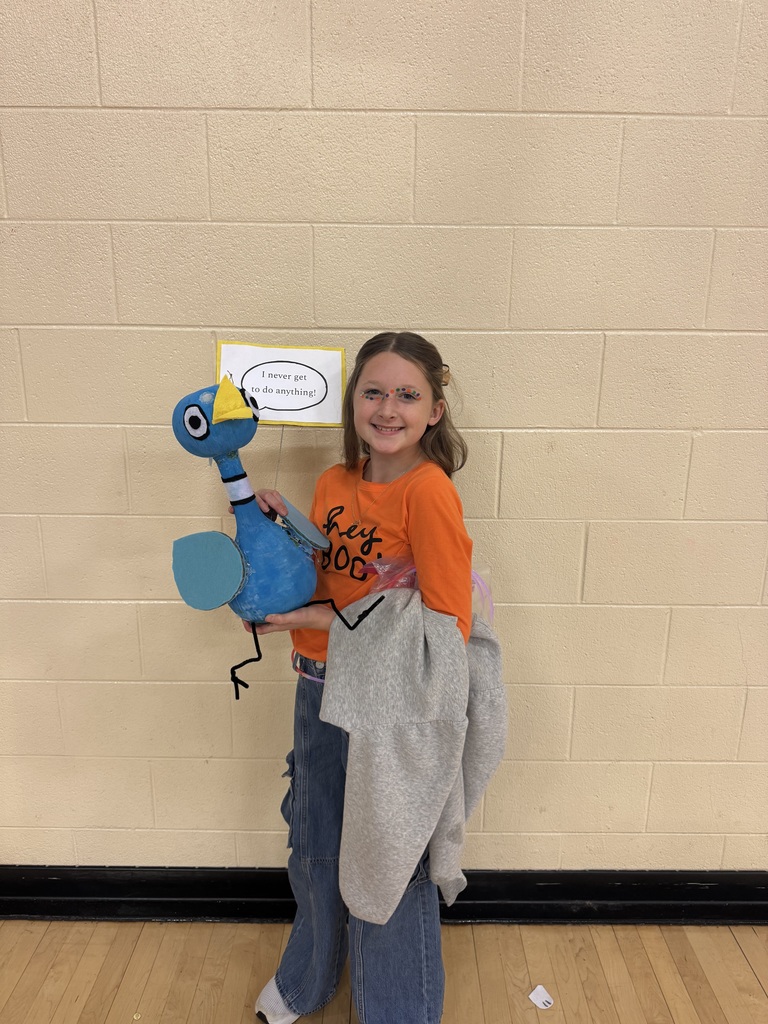 student with pumpkin