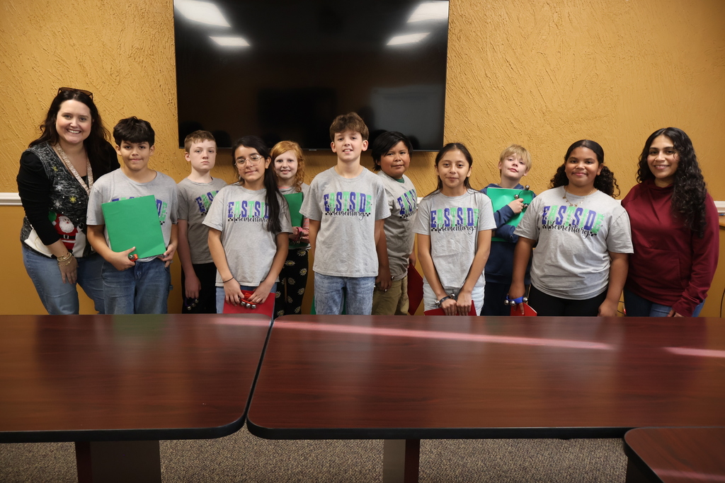 East Side Christmas Carolers Bring Holiday Cheer to the Central Office