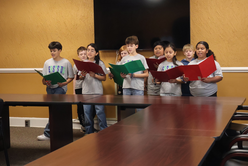 East Side Christmas Carolers Bring Holiday Cheer to the Central Office